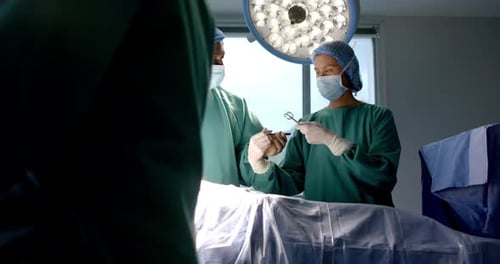 Surgeons Perform Operation in Bright Operating Room