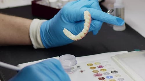 Dental Technician Working on a Prosthesis