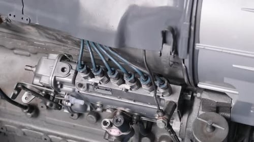 Close Up of a Silver Tractor Engine