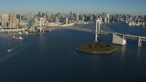 Helicopter view of Tokyo Japan rainbow bridge and dazzling skyline at night
