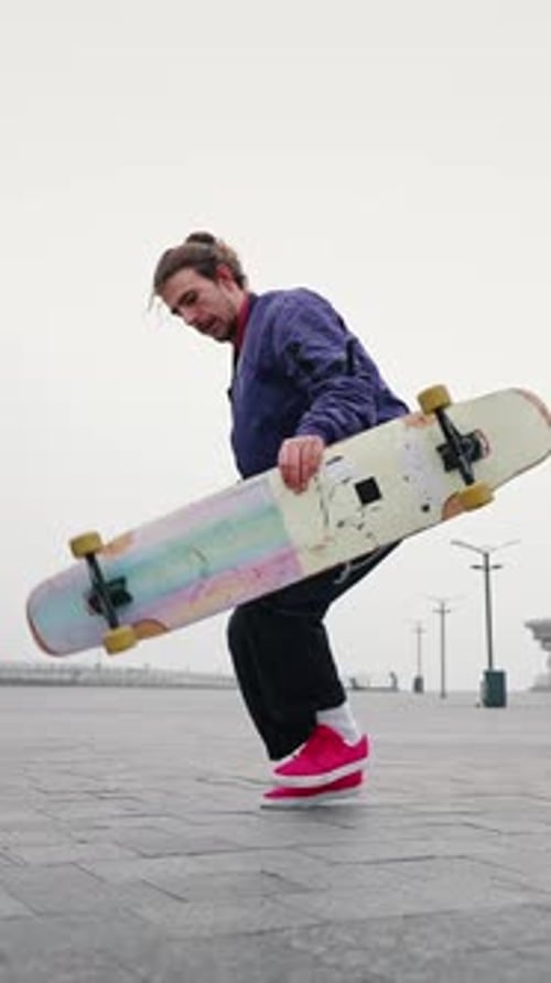 Close Up of Young Man Professional Skater Rides Skateboard or Longboard Swerves and Sways with Flow