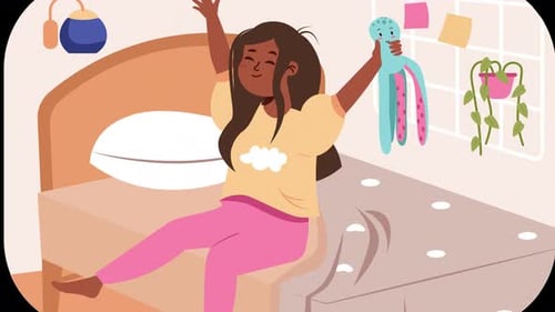 Cheerful girl waking up in a cozy bedroom