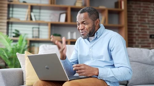 Adult Man Having Bad Video Conference At Home