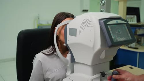 Ophthalmologist Checking Patient's Vision with Autorefractor Keratometer