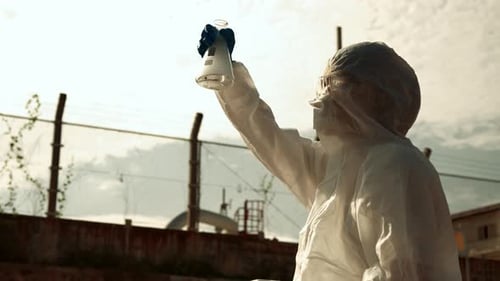 Ecologists sample water contaminated with dangerous, waterhazard toxins into tubes