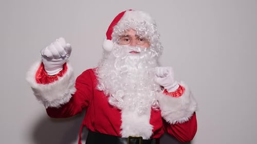 Santa Claus Dancing in a Red Suit