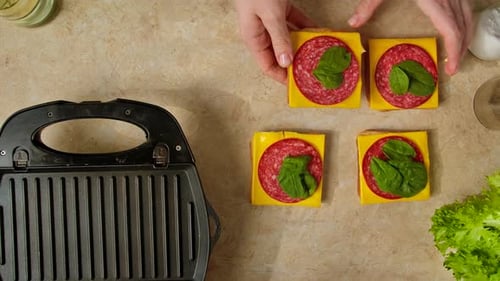 Making Sandwiches with Salami and Cheese Overhead Shot