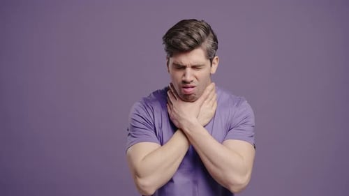 Mature Man Has Sore Sick Guy With Swollen Throat On Violet Studio Angina Pain