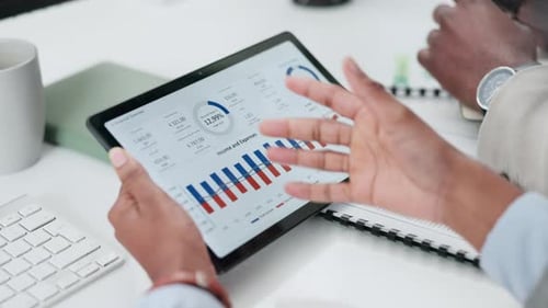 Analyzing Business Data on Tablet in Office