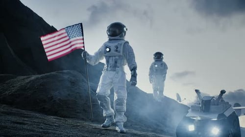 Astronauts with US Flag on Moon-like Landscape