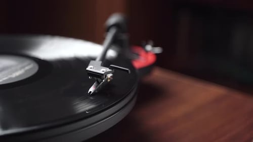 vintage vinyl player in a cozy room. close-up. launch. panorama