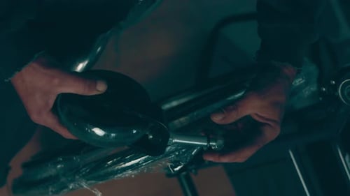 A Disabled Man Assembles a Stroller