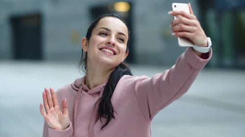 Close Up Smiling Woman Waving Hand To Smartphone Camera. Happy Girl Using Mobile Phone For Video ...