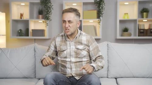 Man with Psychological Problems alone at home.