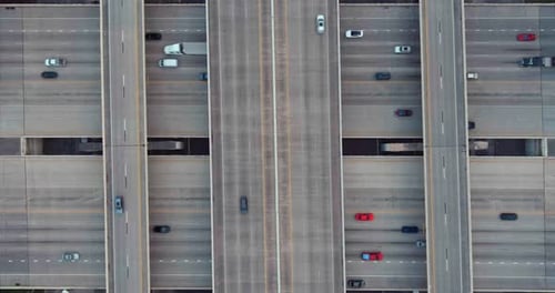 Aerial Top Down View of Multi Lane Highway Traffic Interchanges