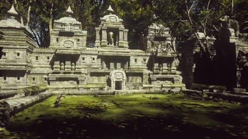Ancient Temple Ruins Surrounded By Lush Greenery in Cambodias Wilderness