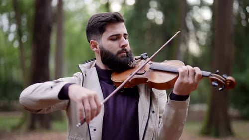 Handsome Man Playing Violin in Forest Portrait of Romantic Musician in Nature