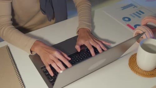 Asia muslim freelancer women wear hijab casual cloth finger typing keyboard laptop at home office.