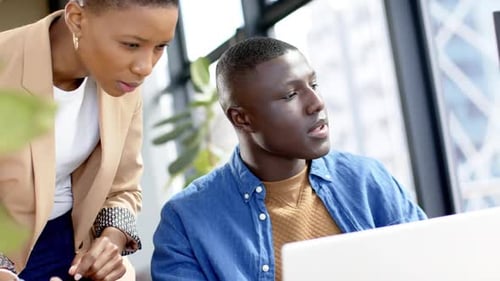 Diverse business people talking and working together in office, slow motion, copy space