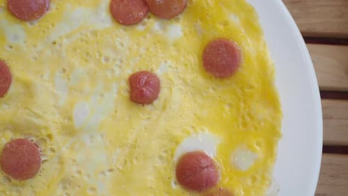 Close Up Omelet with Sliced Sausage