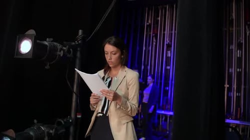 Female Speaker Practicing Reviewing Notes Backstage 2024 Years