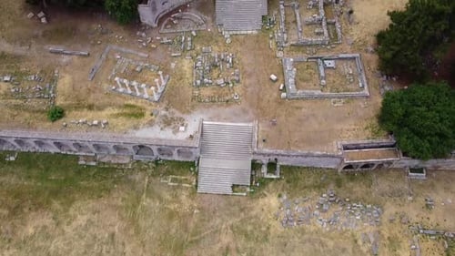 Cinematic drone shot revealing ancient greek ruins and temple