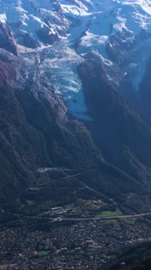 Mont Blanc and Aiguille Du Midi Mountains French Alps France Aerial View Vertical Video