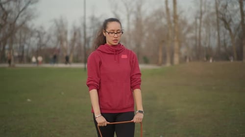 Athlete Stretches Outdoors Female Athlete Warms Up Outside Young Woman Prepares For Run Outdoors