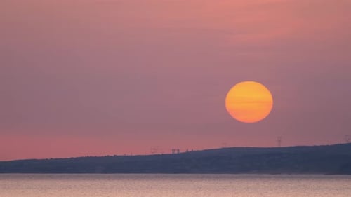 Cruise Ship Sail in Sea on Sunset with Sun