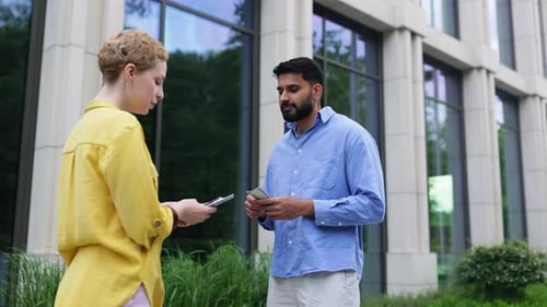 Exchanging Money Outdoors
