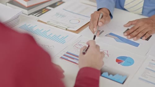 Close up of hands are working and brainstorming on paperwork about business financial and marketing.