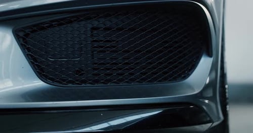 Close up of details of anonymous prestigious modern car. Shot in 8K. Concept of passion for drivin