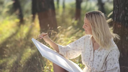 Artist Girl Paints a Picture in the Forest Girl Enjoy Solitude with Nature