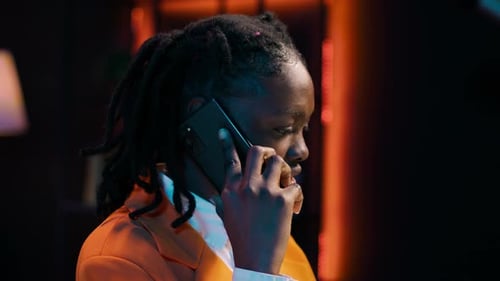 Student Calling Her Professor to Discuss About Class Materials