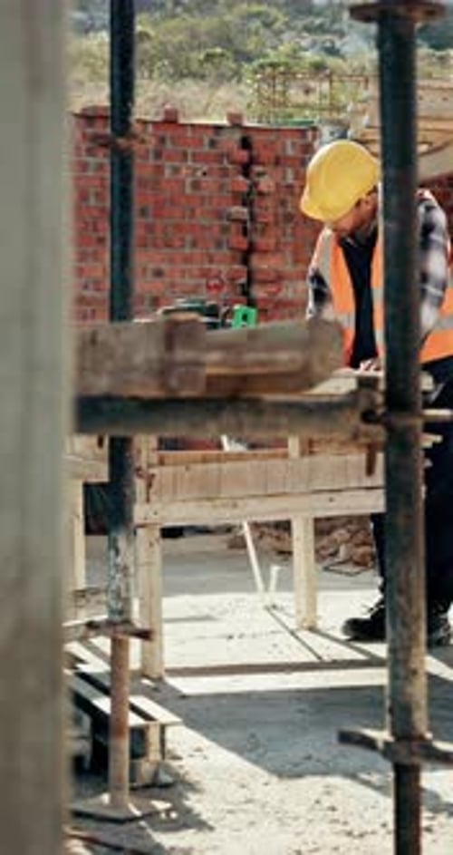 Construction site, man and thinking with floor plan for renovation, building project and vision