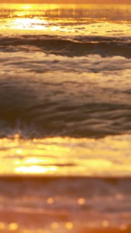 Blurred Background Vertical Sea Ocean Beach During Sunset