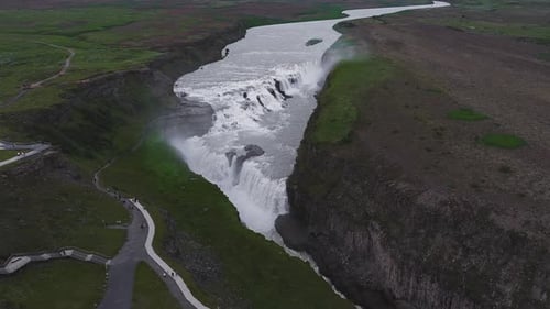 Aerial View of Gullfoss Waterfall Cascading Into a Rugged Canyon