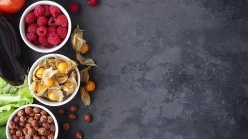 Fresh Colorful Vegetables and Fruits on Dark Background