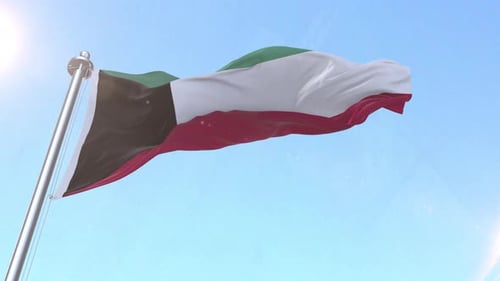 Realistic Kuwait Flag Waving Against Blue Sky
