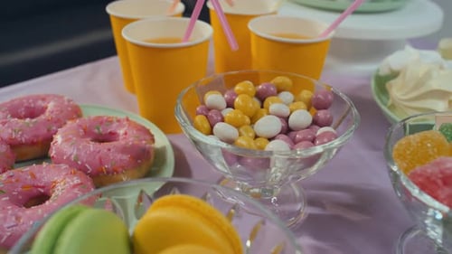 Colorful Candy Buffet with Donuts and Macarons