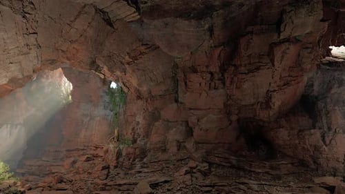 A Cave Filled with Lots of Rocks and Water
