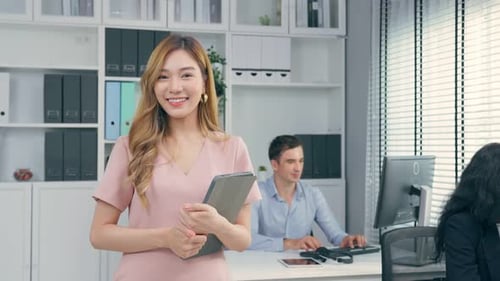 Portrait of Asian beautiful business woman smile while work in office.