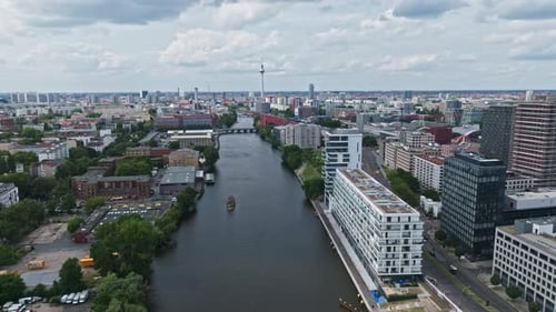Aerial view of modern buildings on the bank of spree river Berlin, Germany .