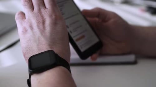 Man scrolling social media in smartphone