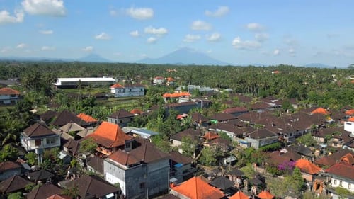 Aerial View of Ubud Rooftops with Jungle and Volcano in Bali Indonesia
