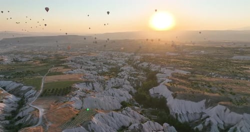 Aerial Cinematic Drone View of Colorful Hot Air Balloon Flying Over Cappadocia