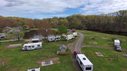 Arial view of a truck pulling a camper to their camping site