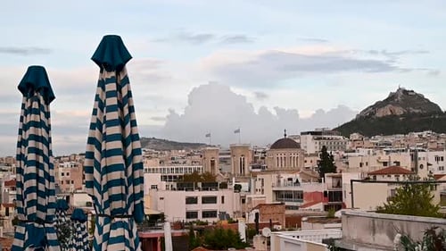View of Lycabettus Hill from a rooftop bar, Athens, Greece, Europe