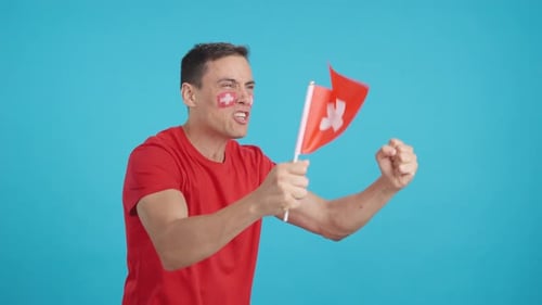 Enthusiastic Man Cheering with Flag