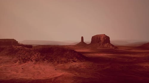 Desert Landscape Showcasing a Majestic Rock Formation From Aerial Perspective
